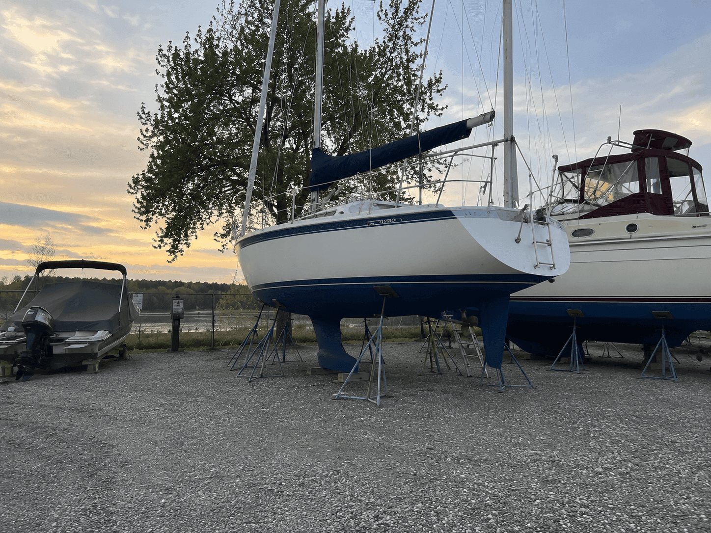 A 24 foot cruiser parked inside the barn bay in November