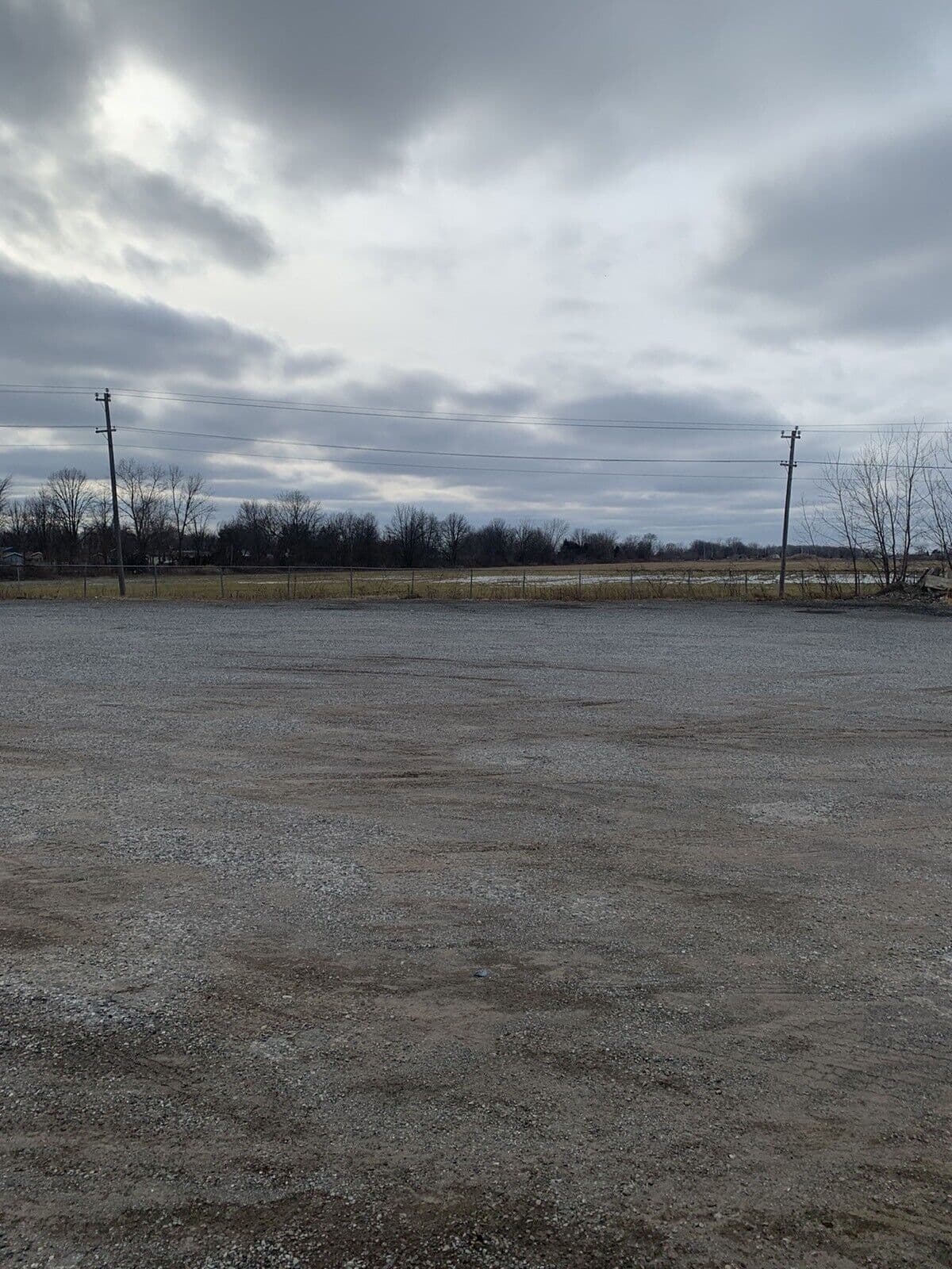 Secure fenced yard for truck and trailer parking near Windsor