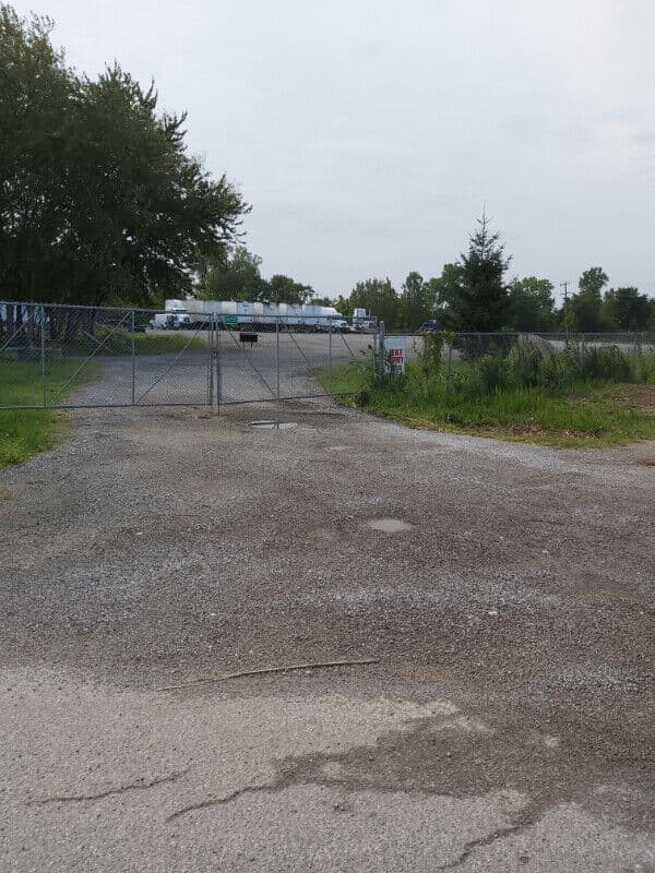 Secure fenced yard for truck and trailer parking near Windsor