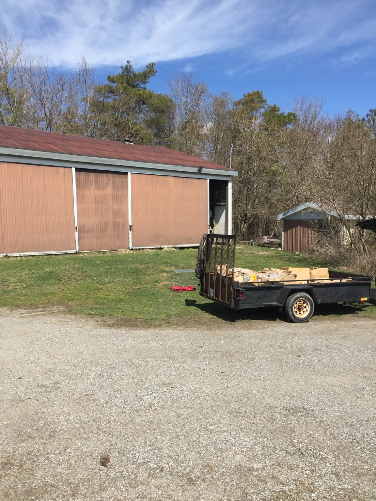 Large rural yard with drive-shed and barn for storage