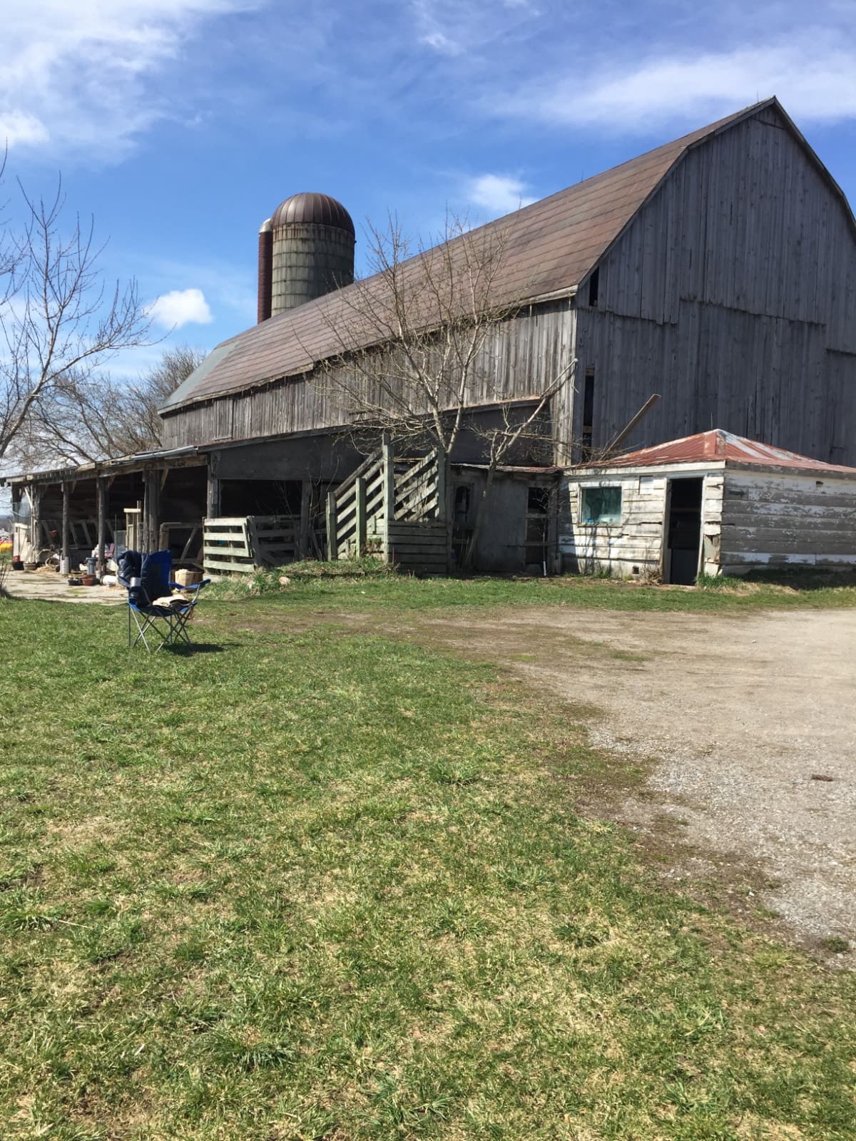 Large rural yard with drive-shed and barn for storage