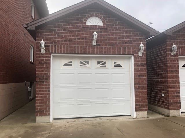 Detached garage for vehicle storage or workspace