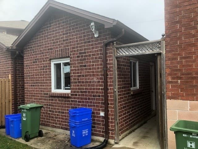 Detached garage for vehicle storage or workspace