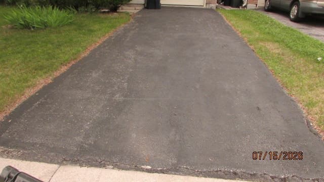 Driveway parking space for one small to medium car