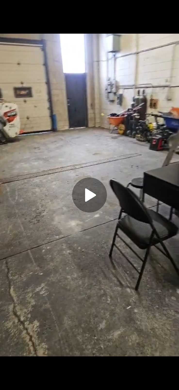 500 sq ft shared warehouse space with drive-in dock access