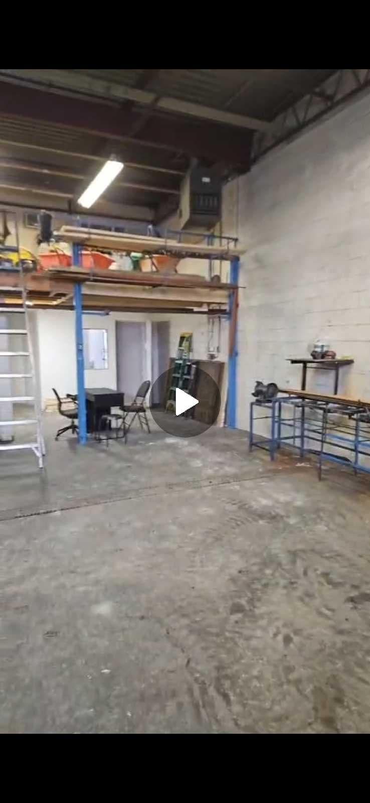 500 sq ft shared warehouse space with drive-in dock access