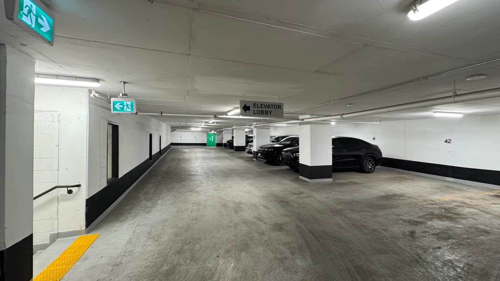 Indoor parking spot near Yorkville elevator lobby