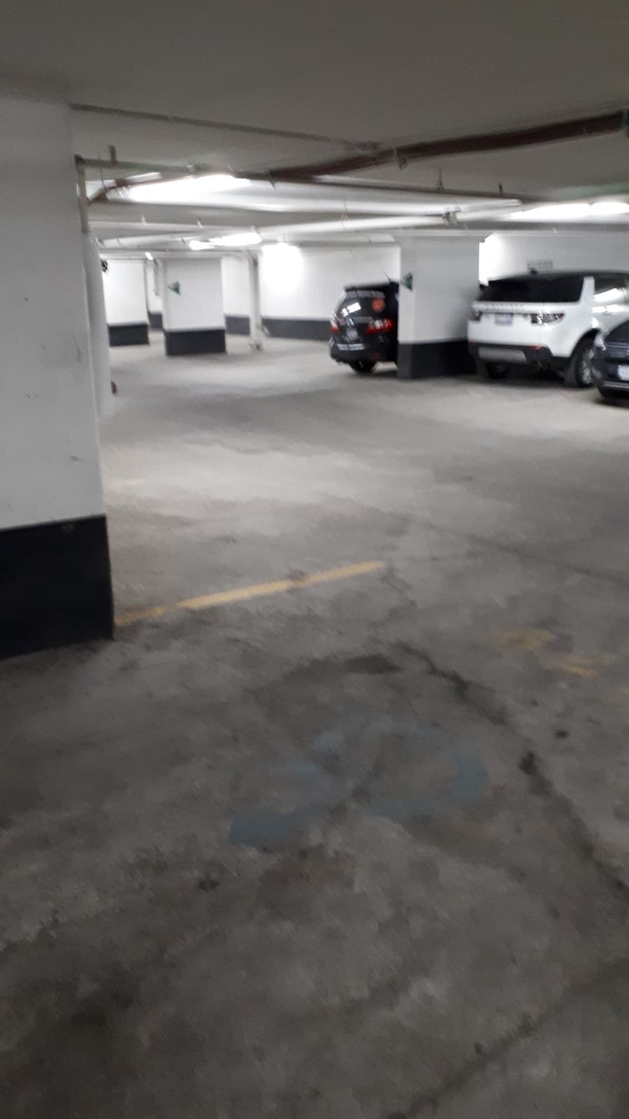 Underground parking spot near elevator lobby