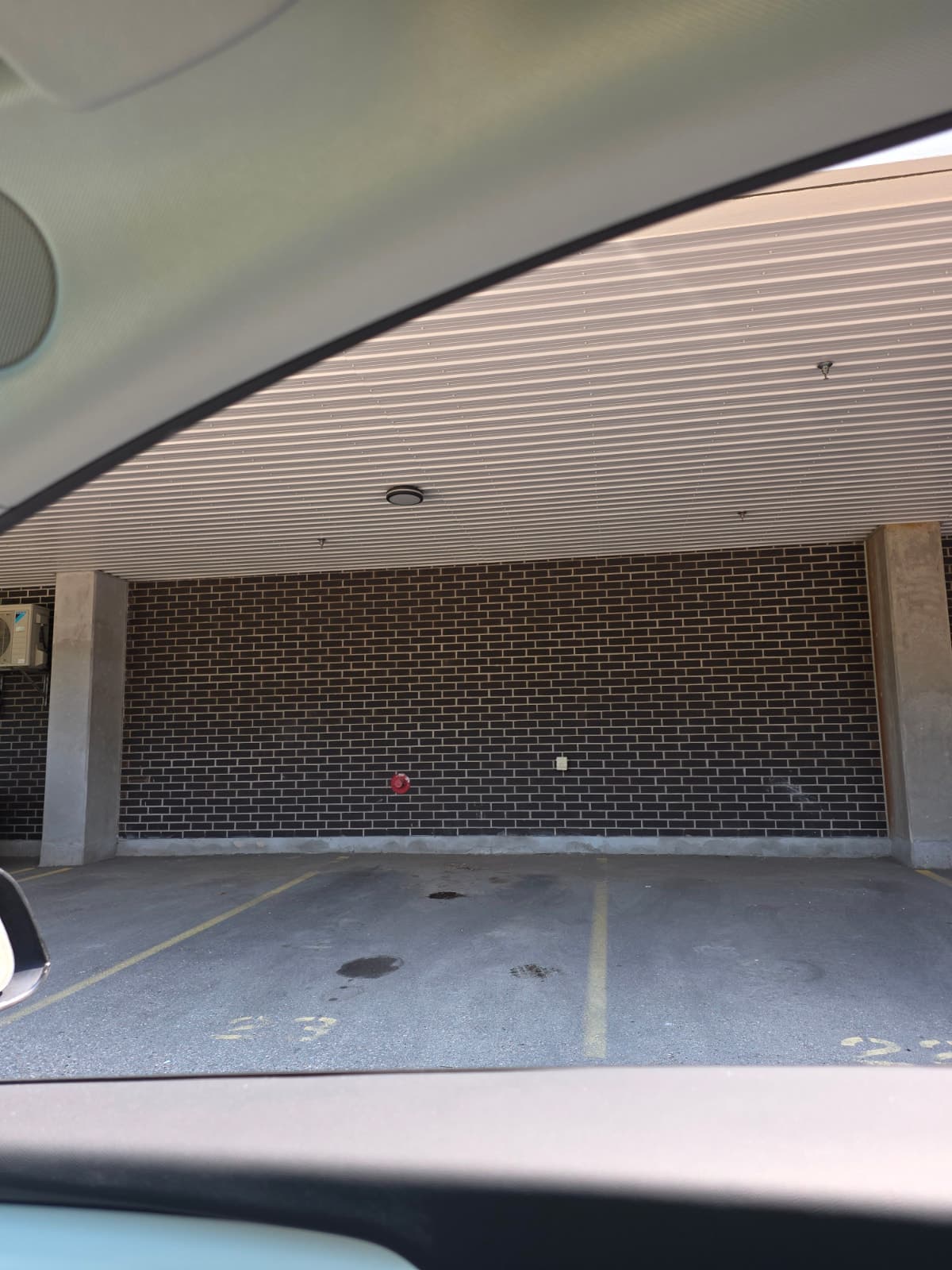 Covered parking space in Waterloo condo building
