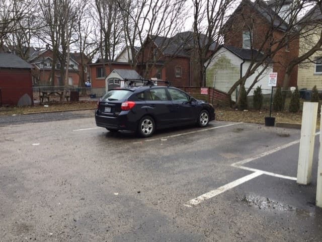 Paved outdoor parking spot near Queen's campus & KGH