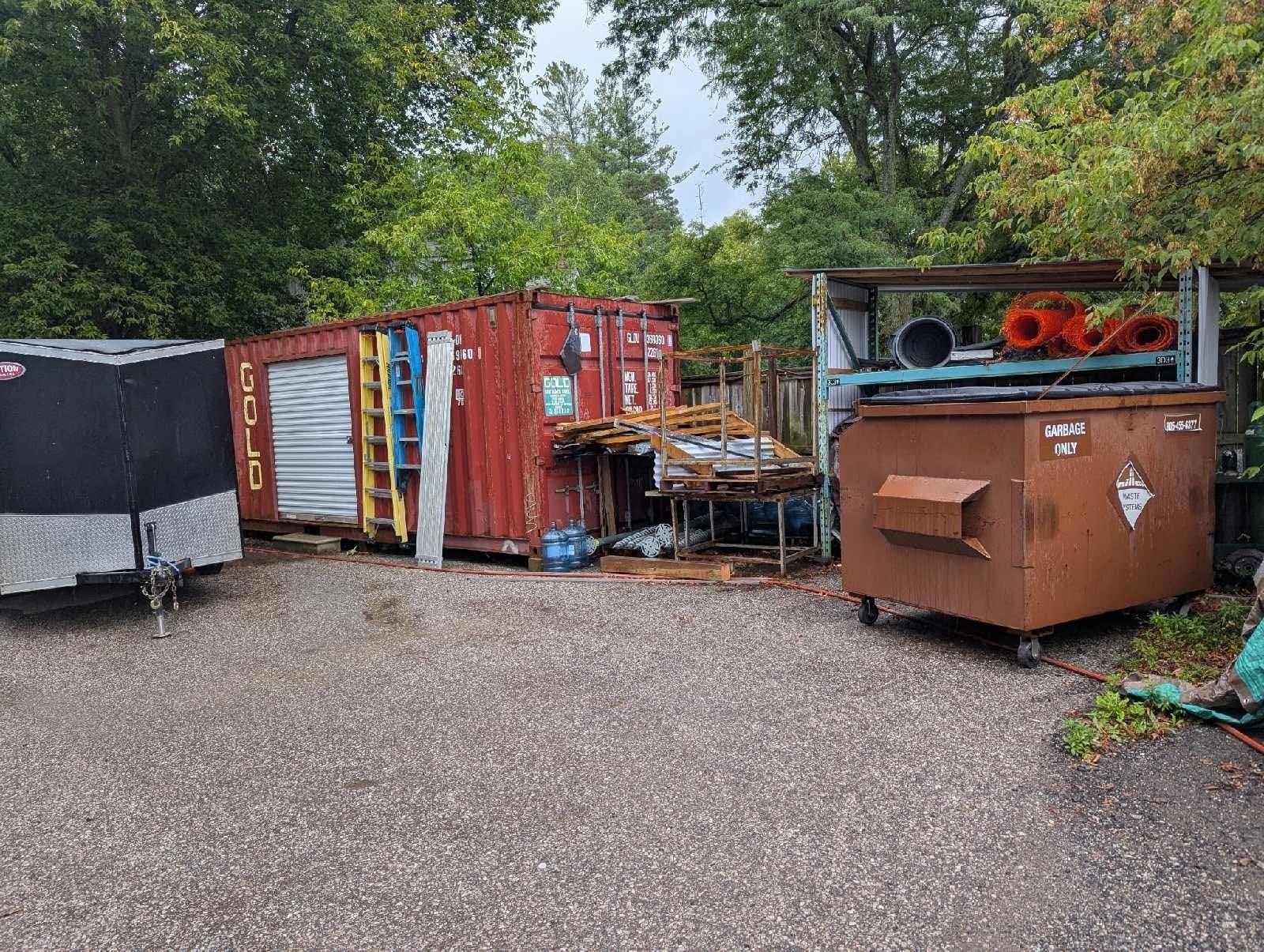 Outdoor gravel lot for vehicle and trailer storage