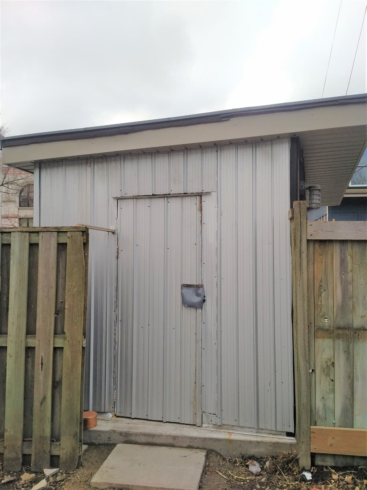 Insulated backyard shed for storage in Junction West