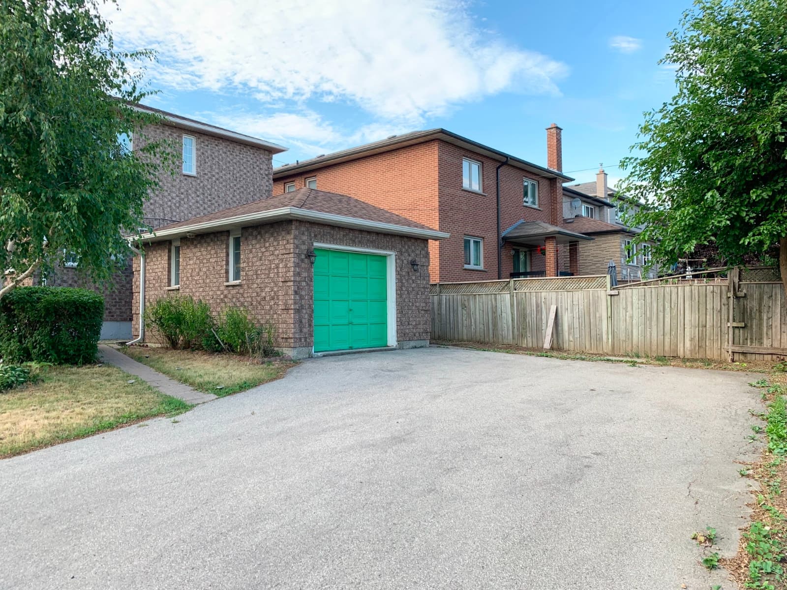 Driveway parking spot near Glencairn Subway Station
