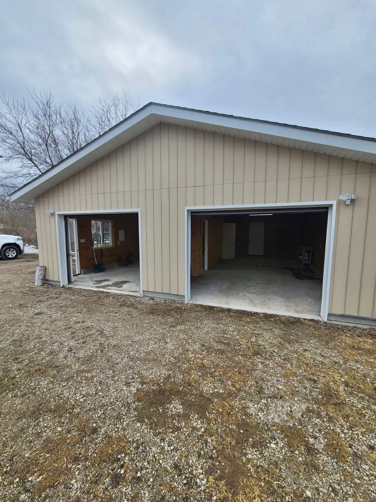 Wide bay doors and separate walk-in entrances